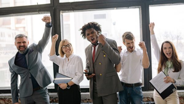 Photo of coworkers celebrating- Financial Forecasting Method blog featured image
